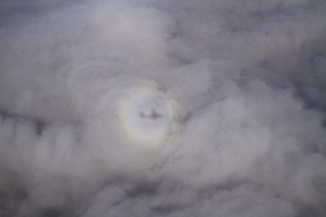 Circular rainbow and shadow of airplane, Kenya